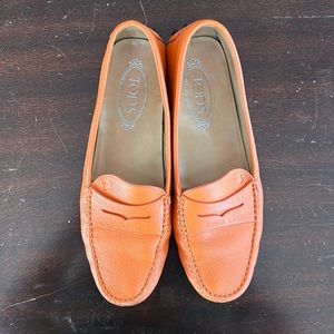 Tod’s orange driving moccasins